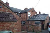 Shoe outworkers' cottages in Earls Barton built in the late 19th century.