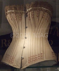 A wasp-waist corset made from khaki coutil from c.1890