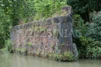 Buttress on the south side of the Grand Union Canal that once carried the railway line between Northampton and Blisworth that was lifted c.1970.