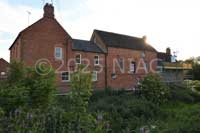Eastern elevation of Kislingbury Mill undergoing renovation in 2019.
