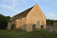A stone-built barn roofed with Collyweston slates, Warmington.