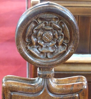 Detail of pew end at Wellingborough School